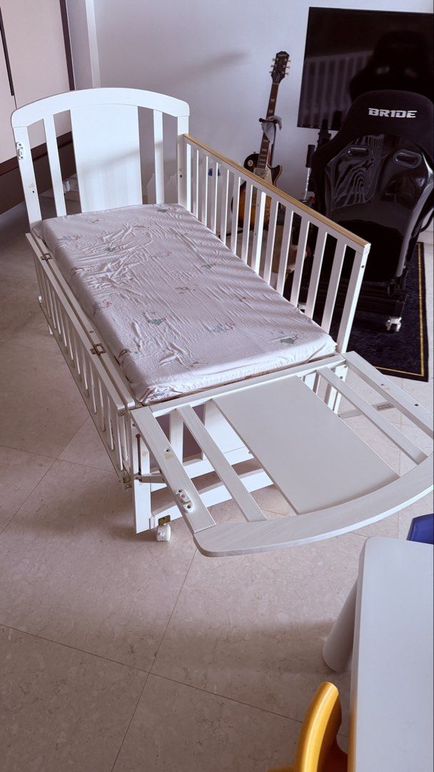 Multi function baby cot/bed (Category: Cots & Cribs) located in Singapore. Submitted by ivanying (Listing ID 1460872620, Image 3). Description: Currently it’s still assembled. Upon confirmation can wait for new owner to come down and dismantle together..