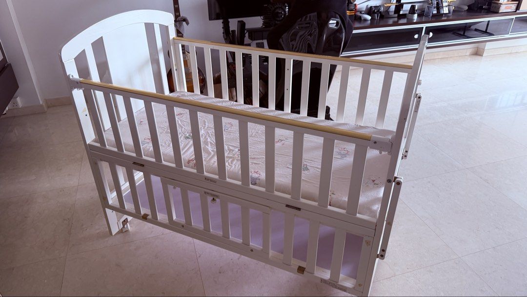 Multi function baby cot/bed (Category: Cots & Cribs) located in Singapore. Submitted by ivanying (Listing ID 1460872620, Image 2). Description: Currently it’s still assembled. Upon confirmation can wait for new owner to come down and dismantle together..