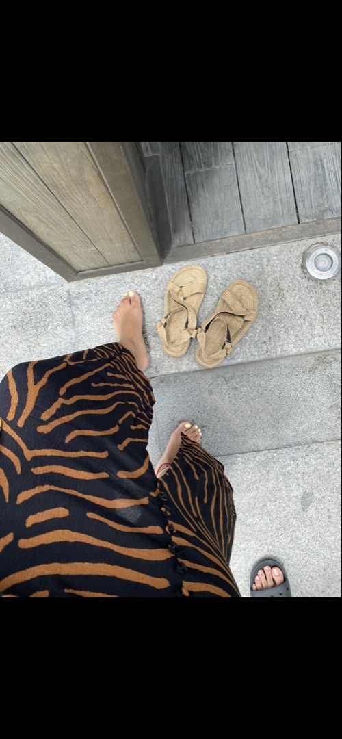 Muni Muni Sandals (Category: Flats & Sandals) located in Muntinlupa City. Submitted by jasmin.shop (Listing ID 1460917928, Image 3). Description: - Comfortable flat sandals - Woven espadrille-style design - Neutral tan color, versatile - Strappy upper with adjustable buckle - Ideal for casual outings and beach trips - Perfect for warm weather Condition: what you see is what you get.