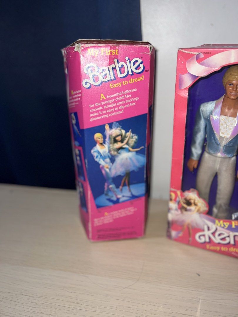 My First Barbie and Ken Dolls (Category: Kids Toys) located in Manila. Submitted by asa68984 (Listing ID 1460875151, Image 3). Description: - My First Barbie and Ken Dolls - Easy to Dress models - Barbie in a white gown - Ken in a sparkly blue jacket and white pants - Boxes show some wear and tear - Great for collectors or play.