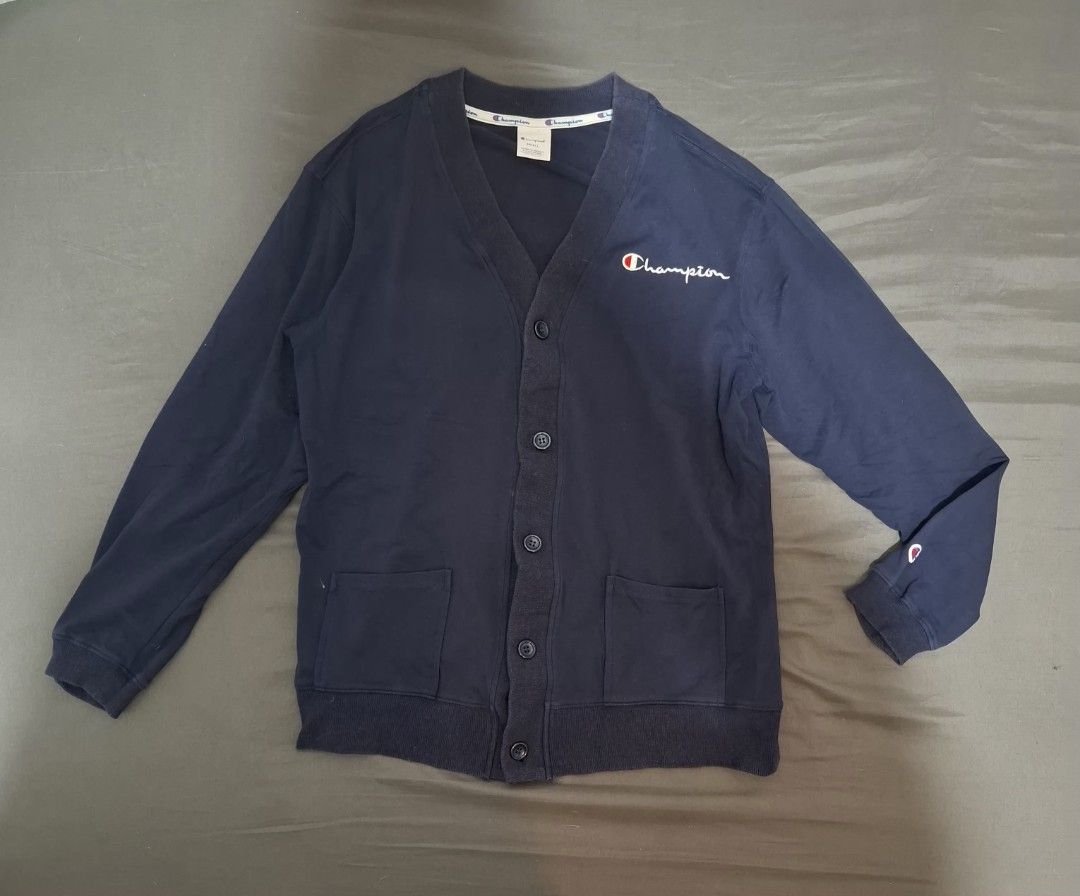 navy blue Champion button-up cardigan (Category: Coats, Jackets and Outerwear) located in Bacoor. Submitted by manilasena (Listing ID 1460901013, Image 1). Description: Champion Cardigan Size Small on tag but can fit to Medium.