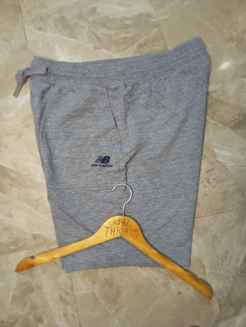 New Balance Grey Sweat Shorts (Category: Shorts) located in Quezon City. Submitted by ThriftsPaMore (Listing ID 1460763668, Image 1). Description: - Brand: New Balance - Color: Grey - Type: Sweat Shorts - Size: XL 30-36 *18.5, Inseam 11.5 - Features: Elastic waistband with drawstring, front pockets - Ideal for: Lounging, casual wear - Material: Comfortable fabric -Excellent Condition Location Quezon City J&T Courier Gcash Payment .