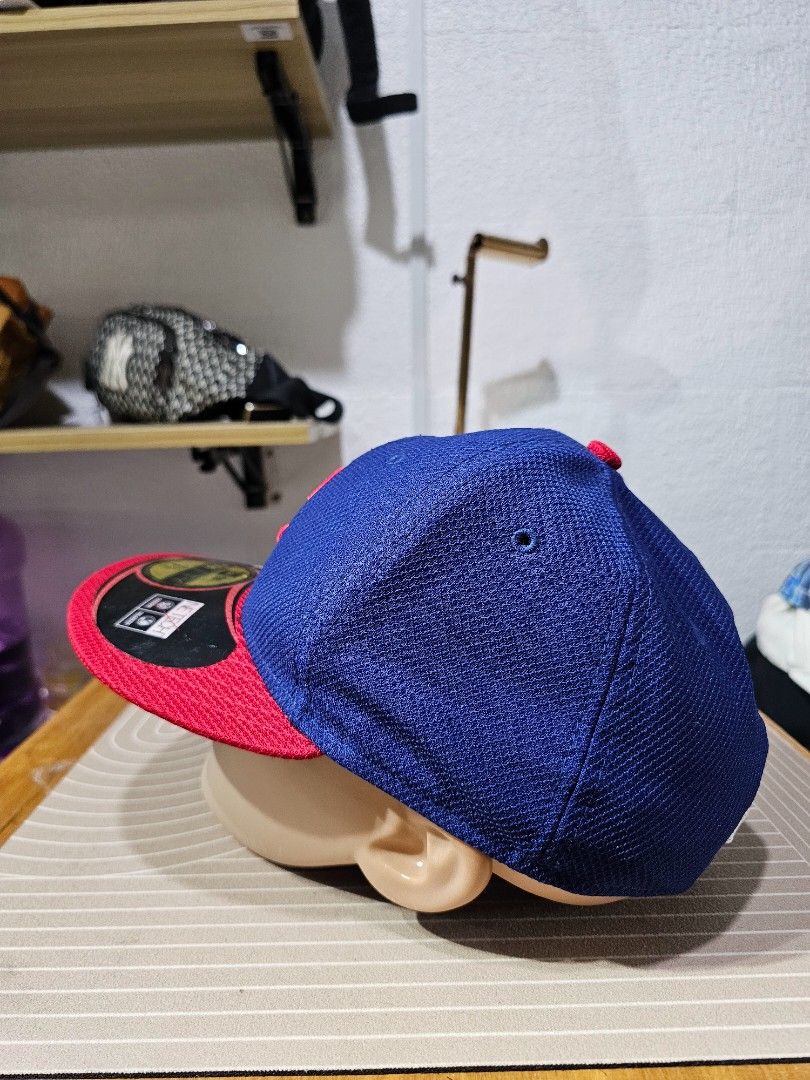 New Era 59FIFTY chicago cubs fitted hat (Category: Caps & Hats) located in Baguio. Submitted by kayeonlineshop (Listing ID 1460773909, Image 3). Description: -blue and red New Era 59FIFTY Chicago Cubs fitted hat featuring the team's signature "C" logo on the front -measurements-7 3/8.