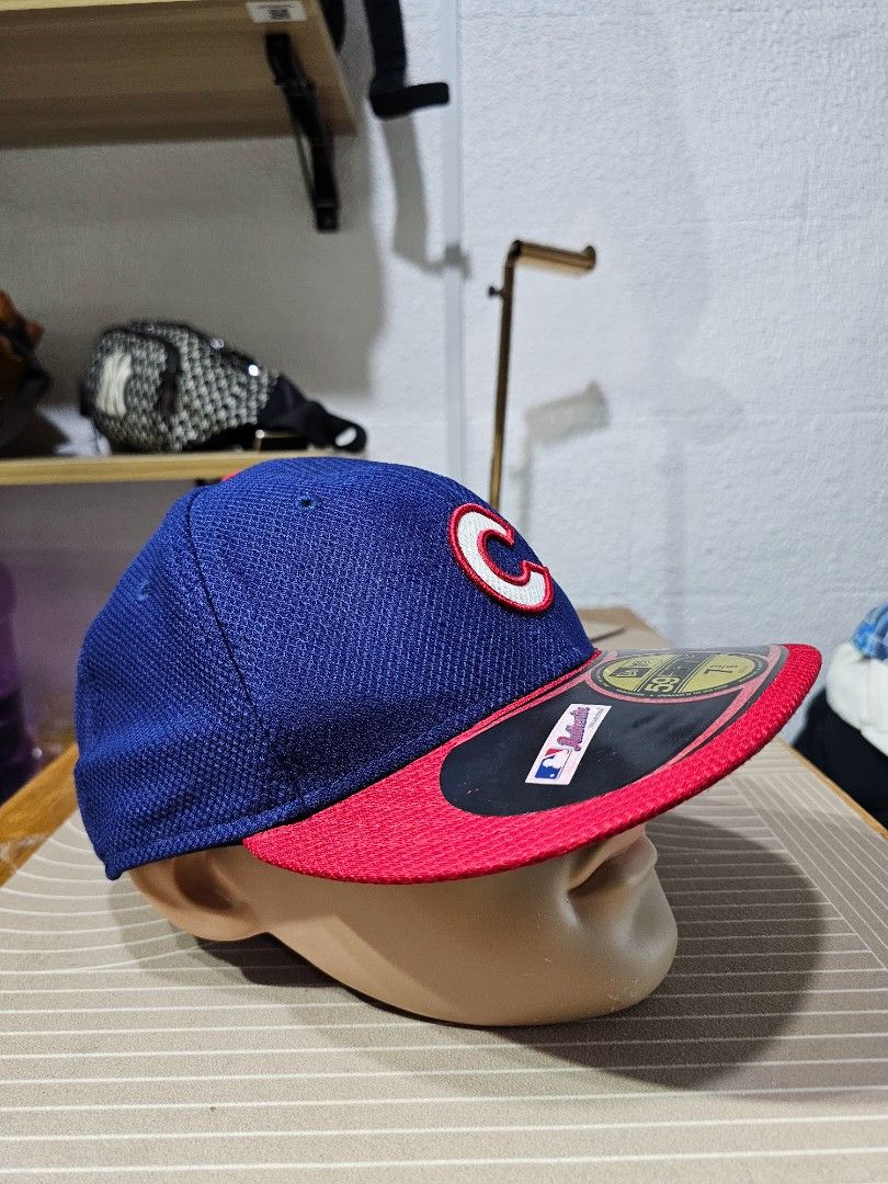 New Era 59FIFTY chicago cubs fitted hat (Category: Caps & Hats) located in Baguio. Submitted by kayeonlineshop (Listing ID 1460773909, Image 2). Description: -blue and red New Era 59FIFTY Chicago Cubs fitted hat featuring the team's signature "C" logo on the front -measurements-7 3/8.
