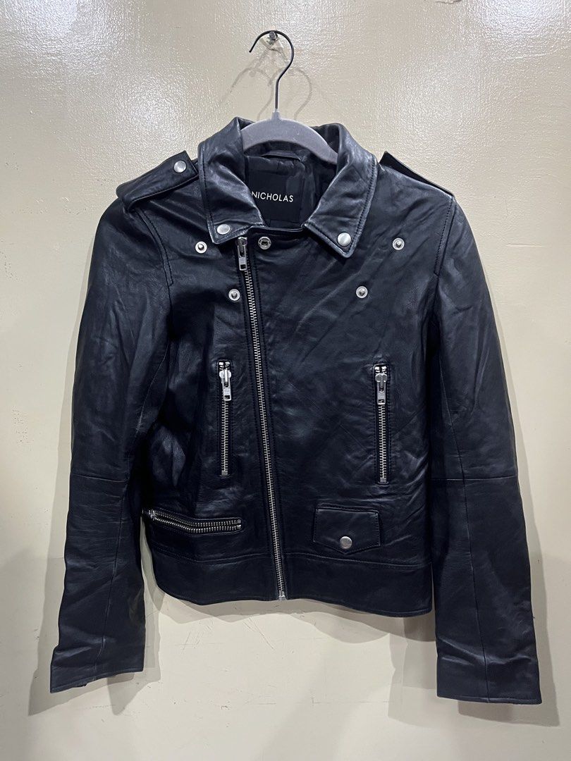Nicholas Genuine Leather Jacket / Black / Size 6 (Category: Coats, Jackets and Outerwear) located in Camalaniugan. Submitted by anarchymonopoly052128 (Listing ID 1460914298, Image 1). Description: Width: 17 Inches Length: 21.5 Inches .