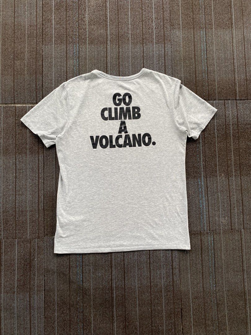 Nike ACG “Go Climb A Volcano” Tee (s19) (Category: Activewear) located in Taguig. Submitted by offther4ck (Listing ID 1460814501, Image 2). Description: - Issue: Faded Neck tag and Wide neckline - Size Large on tag - Dri-Fit - Width: 20 inches - Length: 27 inches.