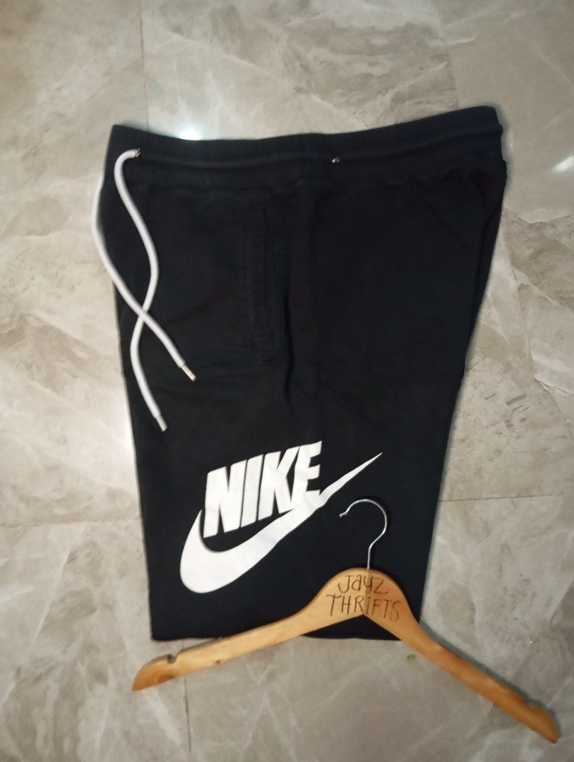 Nike Alumni Black Shorts (Category: Shorts) located in Quezon City. Submitted by ThriftsPaMore (Listing ID 1460766882, Image 1). Description: - Black Nike Alumni shorts - XLarge white swoosh logo 30-38*20, 11.5 Inseam - Adjustable drawstring waist - Two side pockets and 1 Back Pocket - Ideal for workouts or casual wear - Comfortable cotton blend material -9/10 or better Color Rate Issue: Scratch on Garter Location please check pic; tolerable Hair