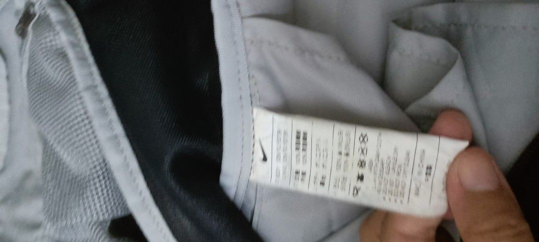 Nike Black Backpack with Large White Swoosh Logo (Category: Backpacks) located in Manila. Submitted by jacovstore1989 (Listing ID 1460742163, Image 3). Description: - Classic black Nike backpack - Iconic large white swoosh logo on front - Main compartment with zipper used - Front pocket with zipper - Adjustable straps for comfort - Ideal for everyday use or sports activities.