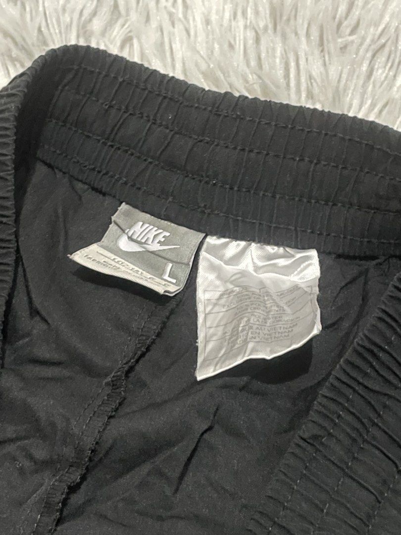 Nike Black Track Pants with White Stripes (Category: Other Bottoms) located in Manila. Submitted by thrift_by_tons08 (Listing ID 1460882844, Image 3). Description: NIKE PANTS Dimes: Waist: 33 - 38 Length: 40.5 Leghole: 9.5 Price: 300 + sf 📍Roxas City, Capiz 5800 🔫 Payment via Gcash 🔫Payment First Policy .
