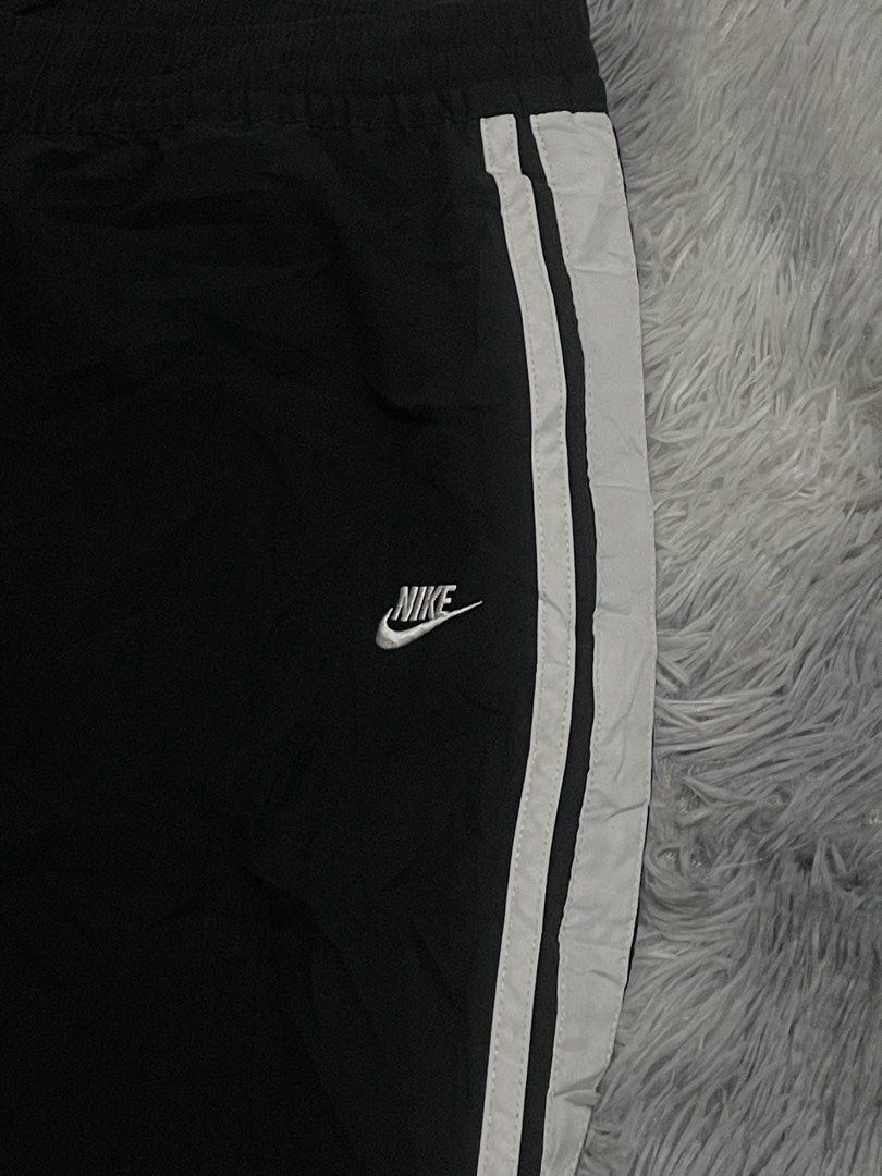 Nike Black Track Pants with White Stripes (Category: Other Bottoms) located in Manila. Submitted by thrift_by_tons08 (Listing ID 1460882844, Image 2). Description: NIKE PANTS Dimes: Waist: 33 - 38 Length: 40.5 Leghole: 9.5 Price: 300 + sf 📍Roxas City, Capiz 5800 🔫 Payment via Gcash 🔫Payment First Policy .