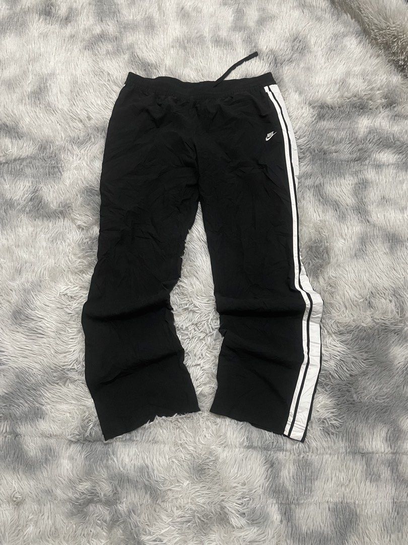 Nike Black Track Pants with White Stripes (Category: Other Bottoms) located in Manila. Submitted by thrift_by_tons08 (Listing ID 1460882844, Image 1). Description: NIKE PANTS Dimes: Waist: 33 - 38 Length: 40.5 Leghole: 9.5 Price: 300 + sf 📍Roxas City, Capiz 5800 🔫 Payment via Gcash 🔫Payment First Policy .