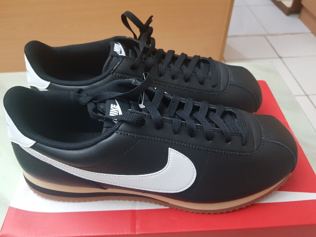 Nike Cortez Black White Gum Sole (Category: Sneakers) located in San Mateo. Submitted by wellhomes (Listing ID 1460849826, Image 1). Description: - Classic Nike Cortez sneakers - Black leather with white swoosh and heel tab - Retro gum sole - Black laces - Essential for any sneaker collection - Ideal for daily wear.