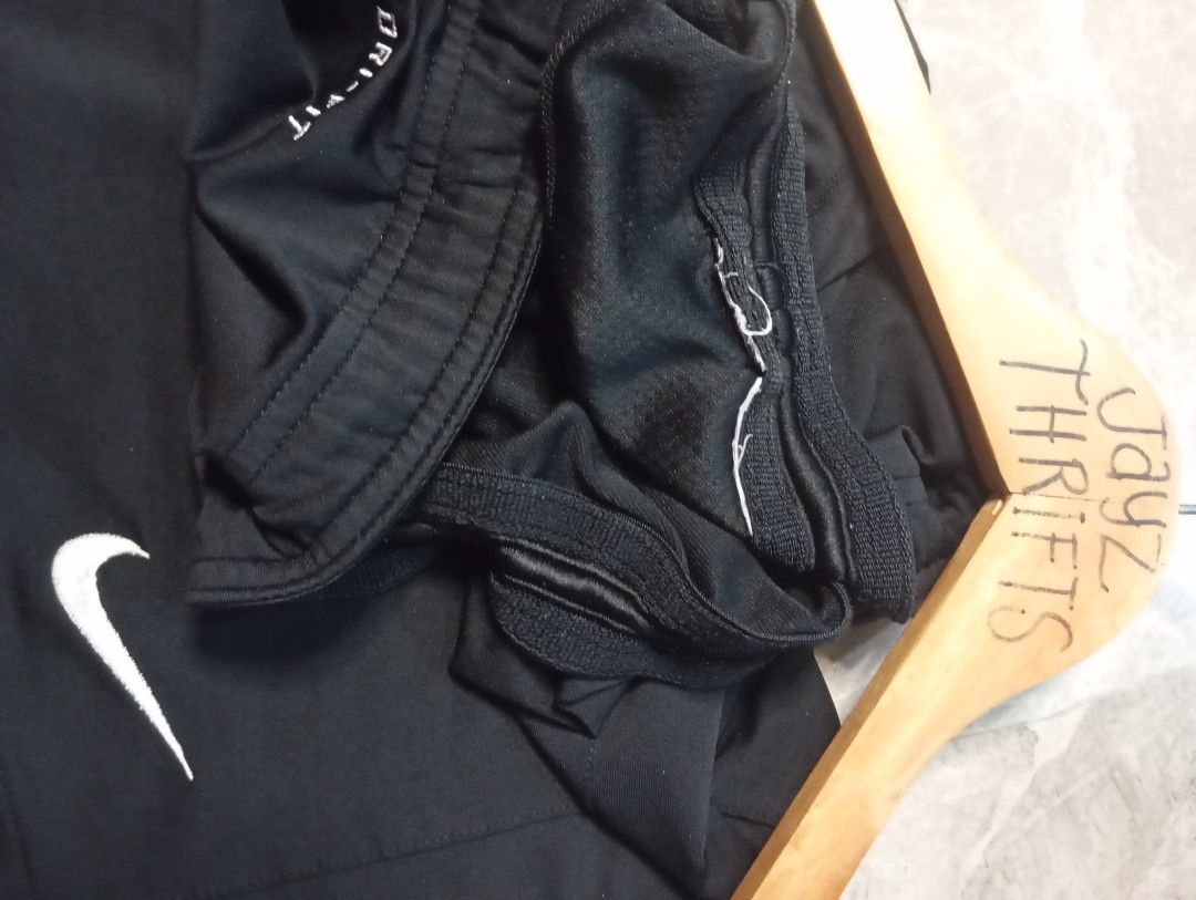 Nike Dri-Fit Black Athletic Shorts (Category: Shorts) located in Quezon City. Submitted by ThriftsPaMore (Listing ID 1460877292, Image 2). Description: - Black Nike Dri-Fit shorts - Elastic waistband with drawstring - Small Nike swoosh logo on the front - Ideal for sports or casual wear - Comfortable and breathable material Size X-XXL 32-42 * 20.5, 10.5 Inseam Very Good to Excellent Condition 9.5 or better Color Rate Issue: Cut Tags but 100% Auth