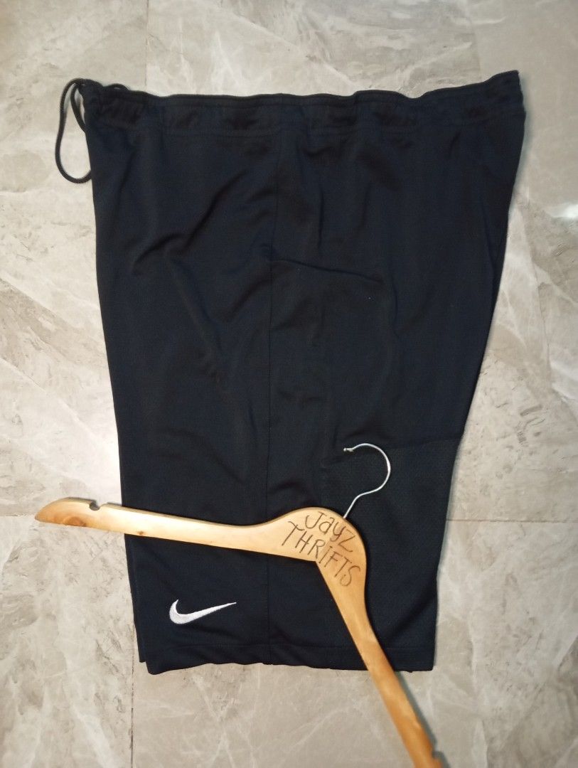 Nike Dri-Fit Black Athletic Shorts (Category: Shorts) located in Quezon City. Submitted by ThriftsPaMore (Listing ID 1460877292, Image 3). Description: - Black Nike Dri-Fit shorts - Elastic waistband with drawstring - Small Nike swoosh logo on the front - Ideal for sports or casual wear - Comfortable and breathable material Size X-XXL 32-42 * 20.5, 10.5 Inseam Very Good to Excellent Condition 9.5 or better Color Rate Issue: Cut Tags but 100% Auth