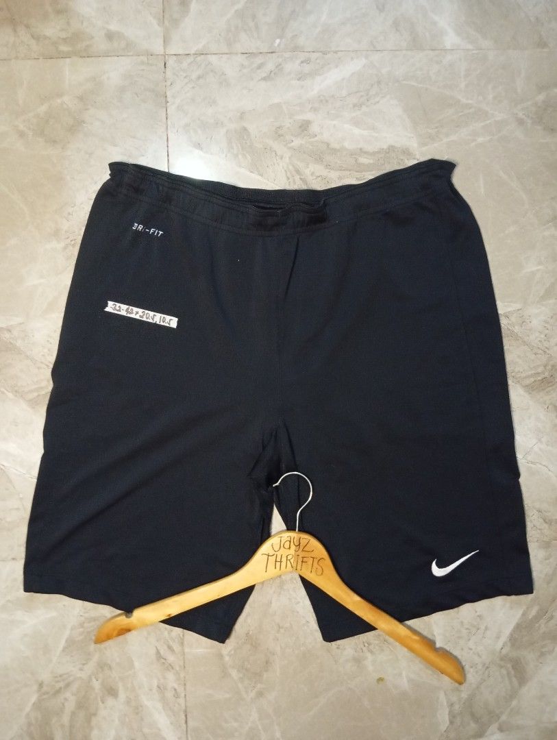 Nike Dri-Fit Black Athletic Shorts (Category: Shorts) located in Quezon City. Submitted by ThriftsPaMore (Listing ID 1460877292, Image 1). Description: - Black Nike Dri-Fit shorts - Elastic waistband with drawstring - Small Nike swoosh logo on the front - Ideal for sports or casual wear - Comfortable and breathable material Size X-XXL 32-42 * 20.5, 10.5 Inseam Very Good to Excellent Condition 9.5 or better Color Rate Issue: Cut Tags but 100% Auth