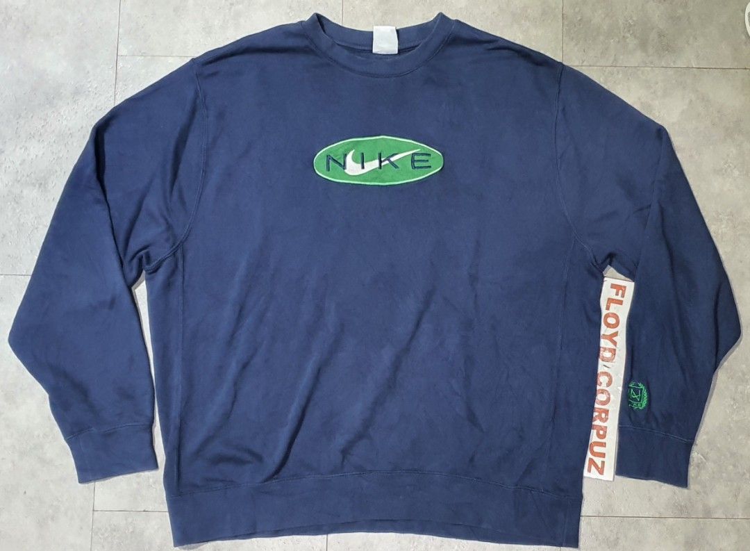 Nike Navy Blue Sweatshirt XXL (Category: Coats, Jackets and Outerwear) located in Laoag. Submitted by floydg_corpuz22 (Listing ID 1460798199, Image 1). Description: Navy blue Nike sweatshirt, size XXL. Features classic oval logo on front and small Nike logo on back. Made in China. Nayki crewneck embroidered Xxl 24x27 Excellent 450+sf.