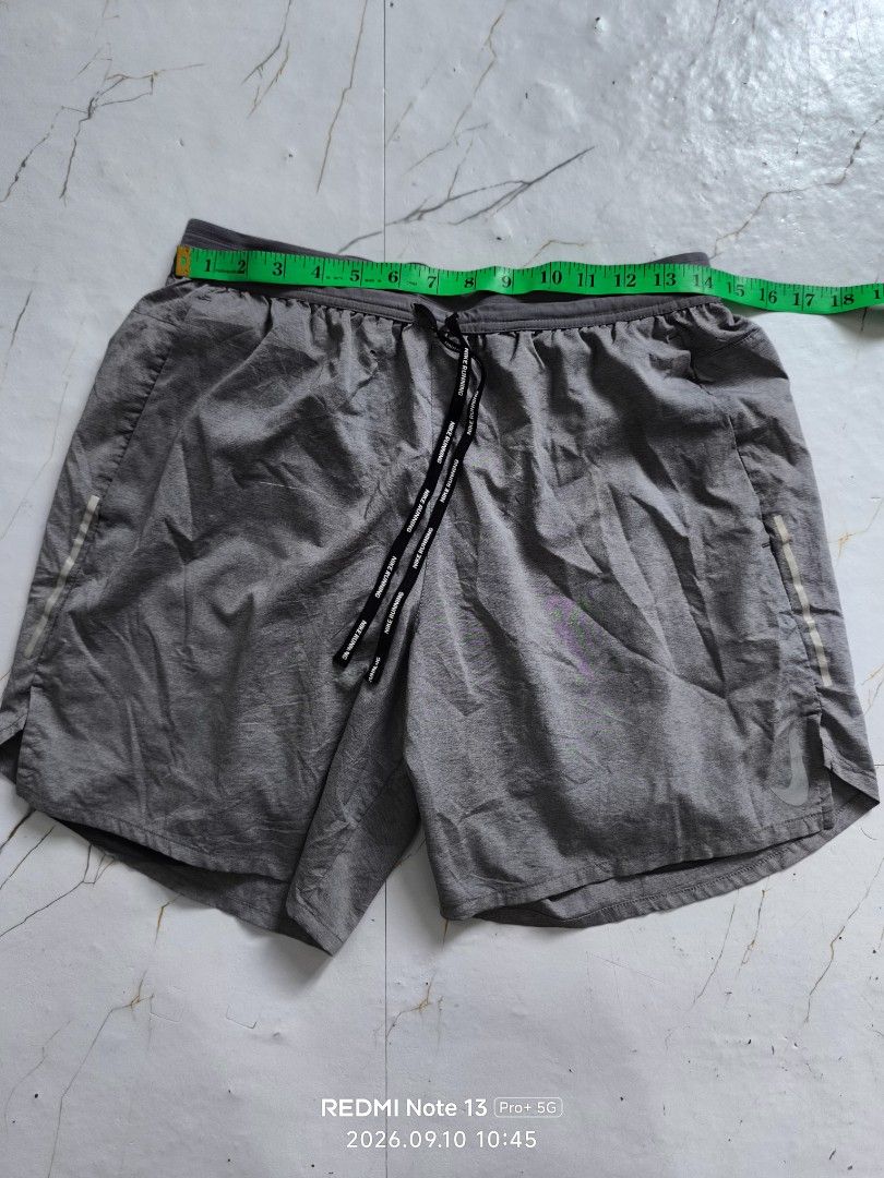 Nike Running Shorts 🔥 (Category: Shorts) located in Maragondon. Submitted by jayharvey66 (Listing ID 1460736901, Image 2). Description: Issues Small hole and minor Scratch See the picture please.