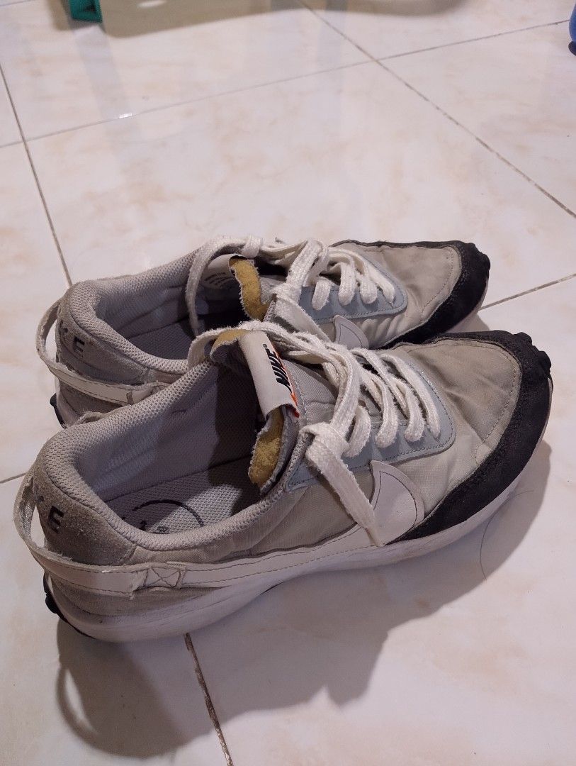 Nike Sacai Waffle Grey White (Category: Sneakers) located in Buhi. Submitted by fpthrift1 (Listing ID 1460825071, Image 3). Description: - Nike Sacai Waffle sneakers - 42.5 - Color: Grey and White - Classic silhouette - Comfortable fit - White laces - Plenty of life remaining - Ideal for casual wear.
