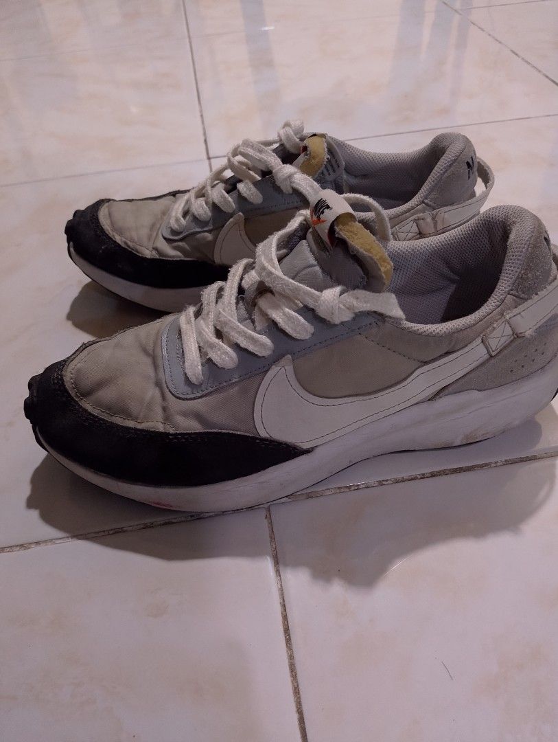 Nike Sacai Waffle Grey White (Category: Sneakers) located in Buhi. Submitted by fpthrift1 (Listing ID 1460825071, Image 1). Description: - Nike Sacai Waffle sneakers - 42.5 - Color: Grey and White - Classic silhouette - Comfortable fit - White laces - Plenty of life remaining - Ideal for casual wear.