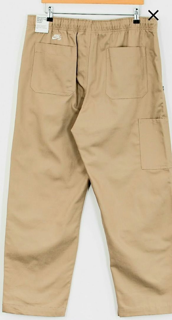 Nike SB double knee (Category: Joggers) located in Angeles City. Submitted by emiljordan0630 (Listing ID 1460718626, Image 1). Description: - Nike SB Khaki Tan Cargo Pants - Elastic waistband with button and zip closure - Multiple pockets, including a right leg cargo pocket - Relaxed fit - Ideal for everyday wear or skating.