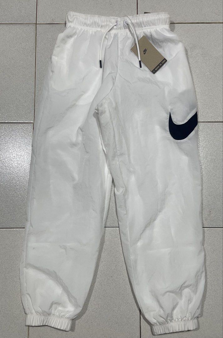 Nike Sportswear Trousers (Category: Other Bottoms) located in Mandaue City. Submitted by MJ_80 (Listing ID 1460802467, Image 1). Description: Nike Womens Sportwear Essentials Mid-Rise Trousers Small on tag Fits 24-31 Waist See photos for measurements New Price : 1,400.