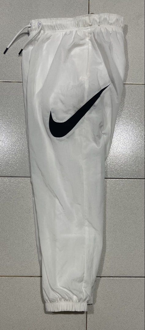Nike Sportswear Trousers (Category: Other Bottoms) located in Mandaue City. Submitted by MJ_80 (Listing ID 1460802467, Image 3). Description: Nike Womens Sportwear Essentials Mid-Rise Trousers Small on tag Fits 24-31 Waist See photos for measurements New Price : 1,400.