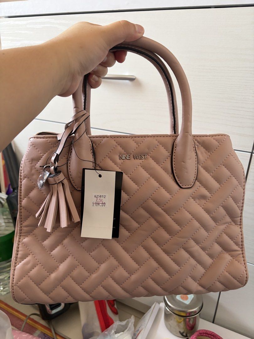 Nine west (Category: Luxury Bags & Wallets) located in Manila. Submitted by theabolivar (Listing ID 1460899725, Image 1). Description: Brandnew nine west bag from europe with tag and dust bag 📍las pinas.