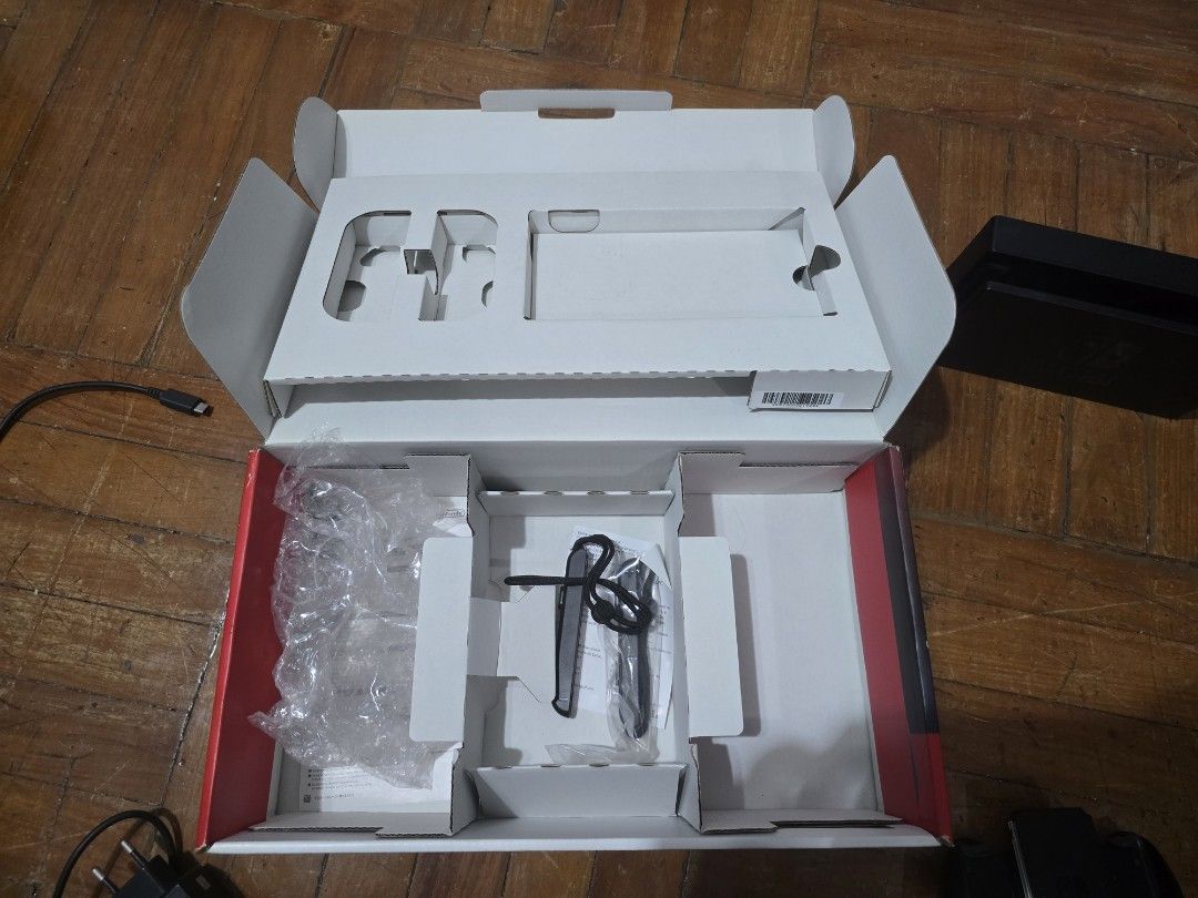 Nintendo Switch V2 Grey (Category: Nintendo) located in San Juan City. Submitted by bpaws (Listing ID 1460837834, Image 3). Description: For sale well-maintained personally + properly stored, barely used and hindi na po masyado nagagamit Nintendo Switch V2 Grey - all basic inclusions: box, charger, hdmi, dock, 2 joycons, 2 grips ✅ - unit with tempered glass + crystal protective shell unit casing from datablitz ✅ - additional branded tempered glas