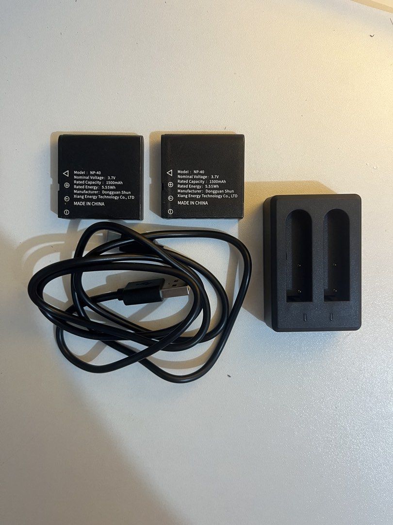 NP-40 batteries and charger (Category: Batteries & Chargers) located in Orani. Submitted by diomahalkitasevenyrsna (Listing ID 1460908931, Image 1). Description: Brand new & working good for digicams NP40 batteries- 150 ea charger & cable- 150 t.a.- 430 sf will be shouldered by the buyer.