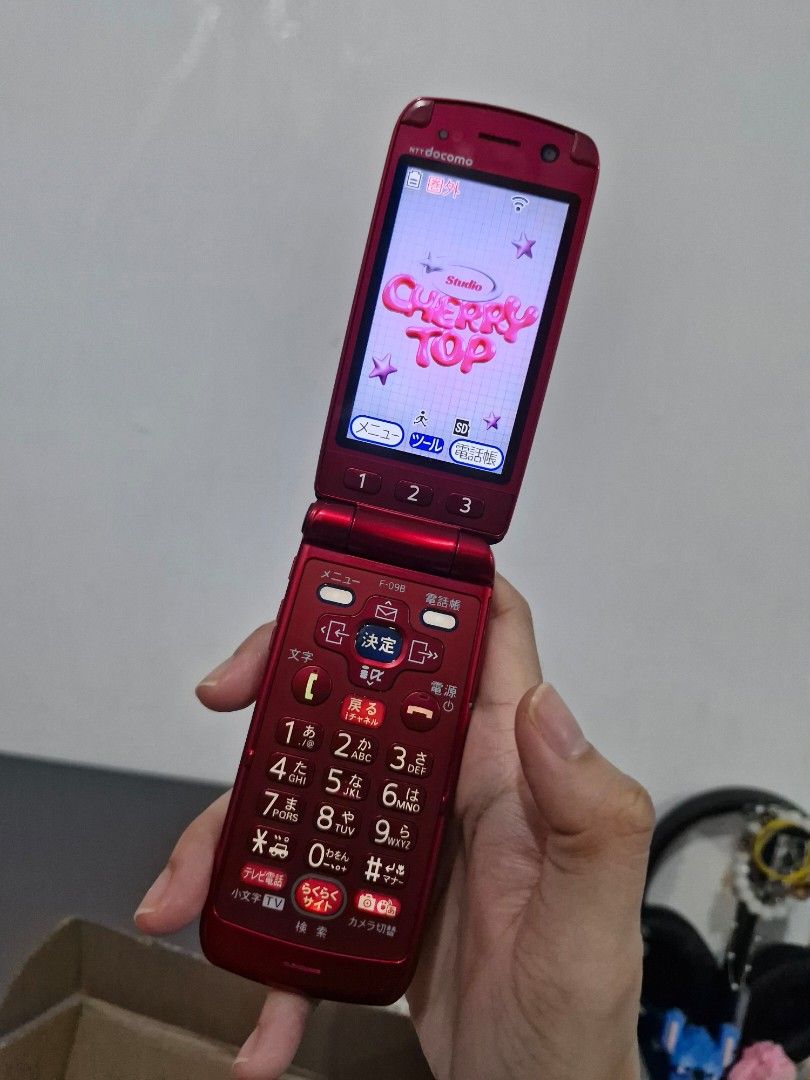 NTT Docomo F-09B Red Flip Phone (Category: Early Generation Mobile Phones) located in Malinao. Submitted by meiimes (Listing ID 1460854875, Image 2). Description: - message me for the video! - very rare vintage japanese flip phone - got it from vintage cherrytop on facebook out of impulse 😓 badly need funds right now - with free phone charm - japan lock/japanese language - good alternative for digicam - payment method (gcash) - selling separatel