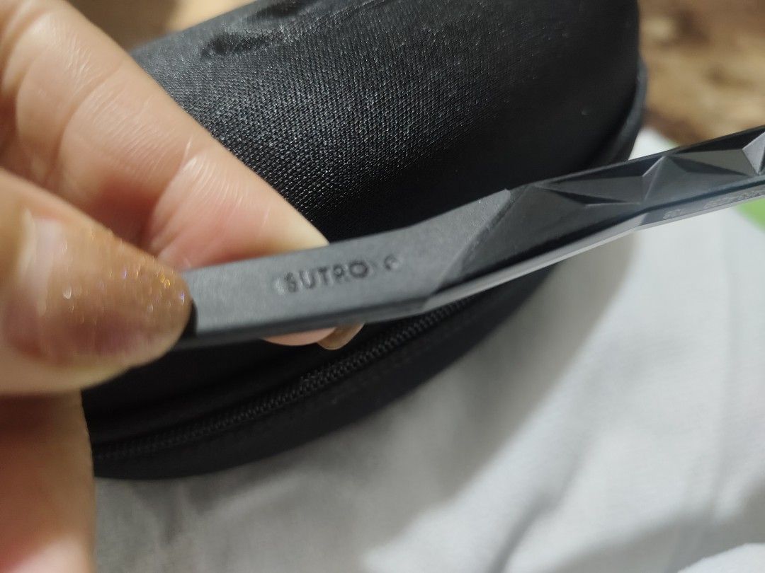 Oakley Sutro Sunglasses with Case (Category: Sunglasses & Eyewear) located in Caloocan City. Submitted by loralievil28183 (Listing ID 1460853391, Image 3). Description: - Oakley Sutro Sunglasses - Black Frame - Blue/Purple Mirrored Lenses - Includes Original Hard Case - Ideal for Sports and Everyday Wear.
