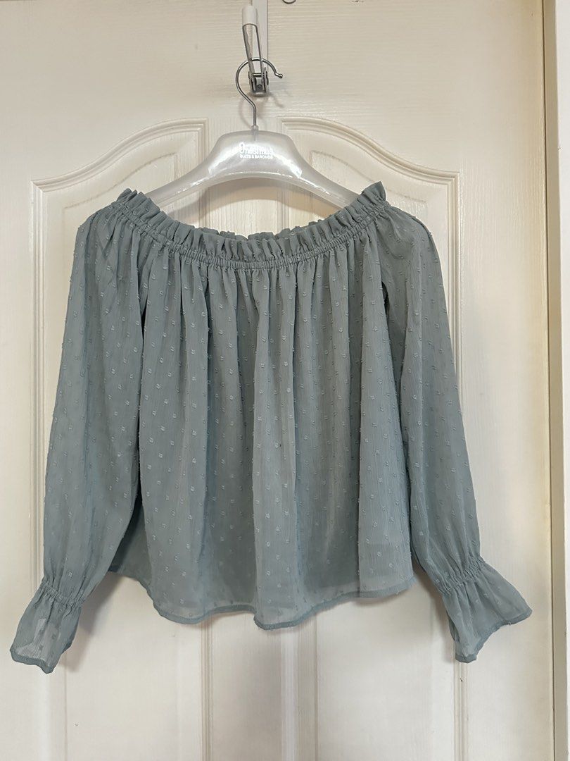 Off-shoulder Puff Sleeve Blouse (Category: Blouses) located in Manila. Submitted by nfcloset_ (Listing ID 1460792003, Image 1). Description: - Cute off-shoulder design - Light and airy fabric with textured dot pattern - Elasticated neckline and cuffs for a comfortable fit - Long puff sleeves with ruffled hem detail - Versatile for casual day or night out looks.