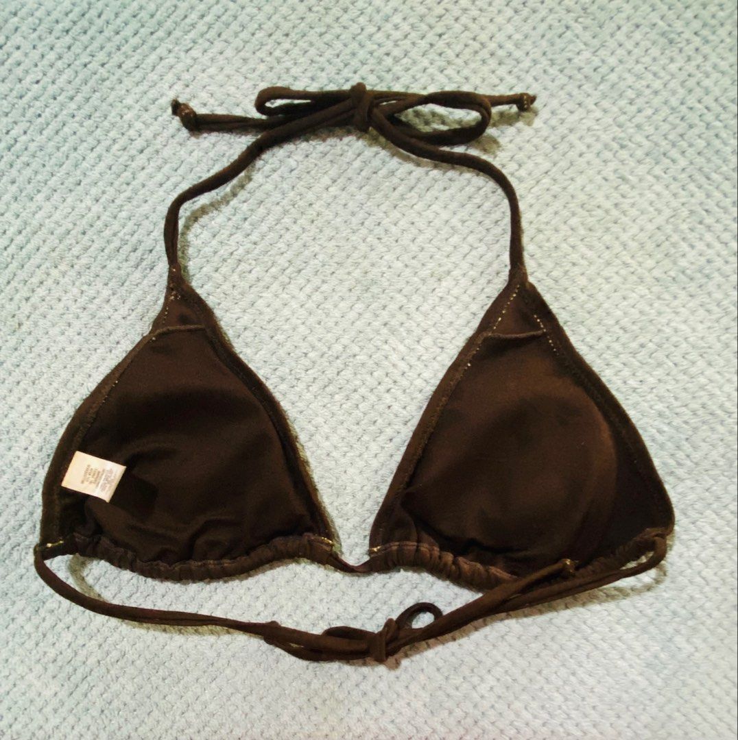 Old Navy Brown Triangle Bikini Top (Category: Bikinis & Swimsuits) located in Bacolod City. Submitted by bravefire_3fe6dd (Listing ID 1460747889, Image 2). Description: - Old Navy brown triangle bikini top - Ties at neck and back - Material: 82% nylon, 18% spandex (shell); 100% polyester (lining) - Care Instructions: Machine wash cold with like colors, non-chlorine bleach when needed, line dry, do not iron - Origin: Made in China.