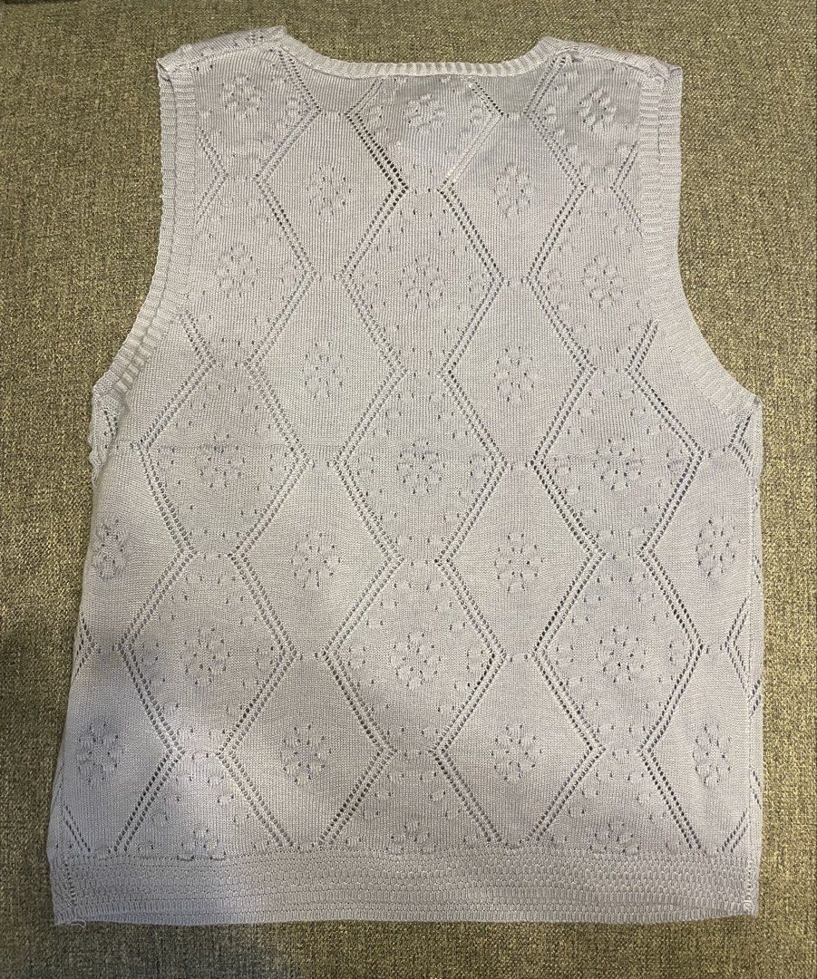 One K BKK Knit V-Neck Sleeveless (Category: Blouses) located in Quezon City. Submitted by mfordma (Listing ID 1460908491, Image 3). Description: BRAND NEW Originally bought for 480.00 Doing a little closet decluttering! ✨ Letting go of some pieces that are still in great condition and looking for a new home. 🤍 Brand: ONE-K Size: Free size Color: Powder/Light Blue Description: - Very stretchable soft knit V-neckline sleeveless design - Features a
