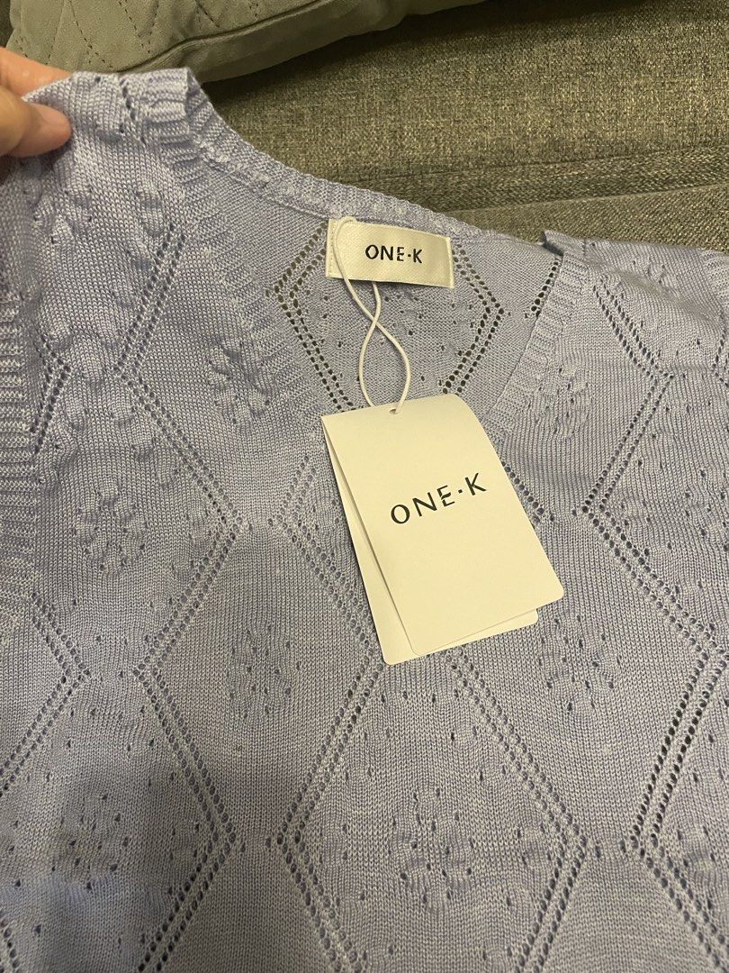 One K BKK Knit V-Neck Sleeveless (Category: Blouses) located in Quezon City. Submitted by mfordma (Listing ID 1460908491, Image 2). Description: BRAND NEW Originally bought for 480.00 Doing a little closet decluttering! ✨ Letting go of some pieces that are still in great condition and looking for a new home. 🤍 Brand: ONE-K Size: Free size Color: Powder/Light Blue Description: - Very stretchable soft knit V-neckline sleeveless design - Features a