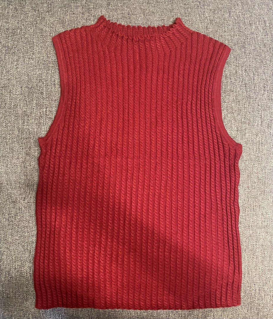 One K BKK Ribbed Turtle Neck Sleeveless (Category: Blouses) located in Quezon City. Submitted by mfordma (Listing ID 1460907702, Image 1). Description: BRAND NEW Originally bought for 480.00 Doing a little closet decluttering! ✨ Letting go of some pieces that are still in great condition and looking for a new home. 🤍 Brand: ONE-K Size: Free size Color: Red Description: - Very stretchable ribbed intricate cable knit detailing top - Mock neck with