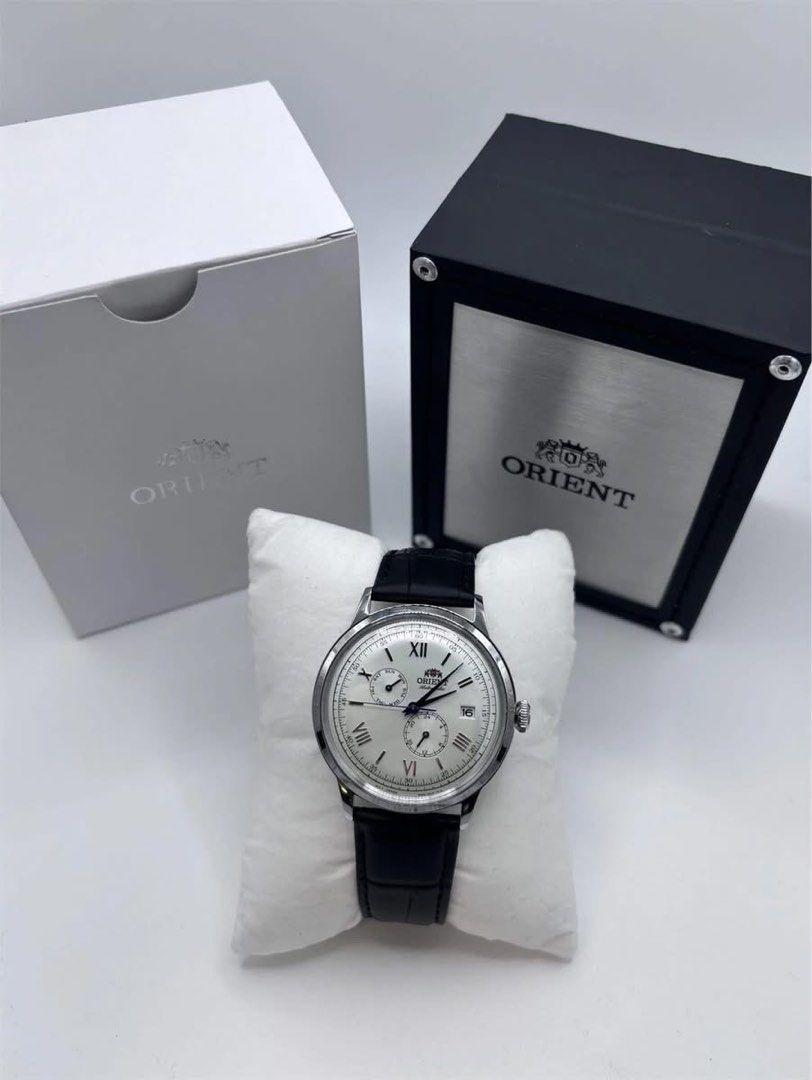 Orient Bambino RA-AK0701S (Category: Luxury Watches) located in Manila. Submitted by seikowatchfactory (Listing ID 1460732163, Image 1). Description: Model: RA-AK0701S Price: 12995 Specifications: Caliber F6B22 Mechanical Movement Case Diameter: 40.5mm Case Thickness: 12.6mm Lug Size: 21mm 22 Jewels Weight: 65g See Through Case Back Mineral Crystal 40 hours Power Reserve 30m Water Resistance Seller is Authorized Dealer of Japanese Watches Meetups