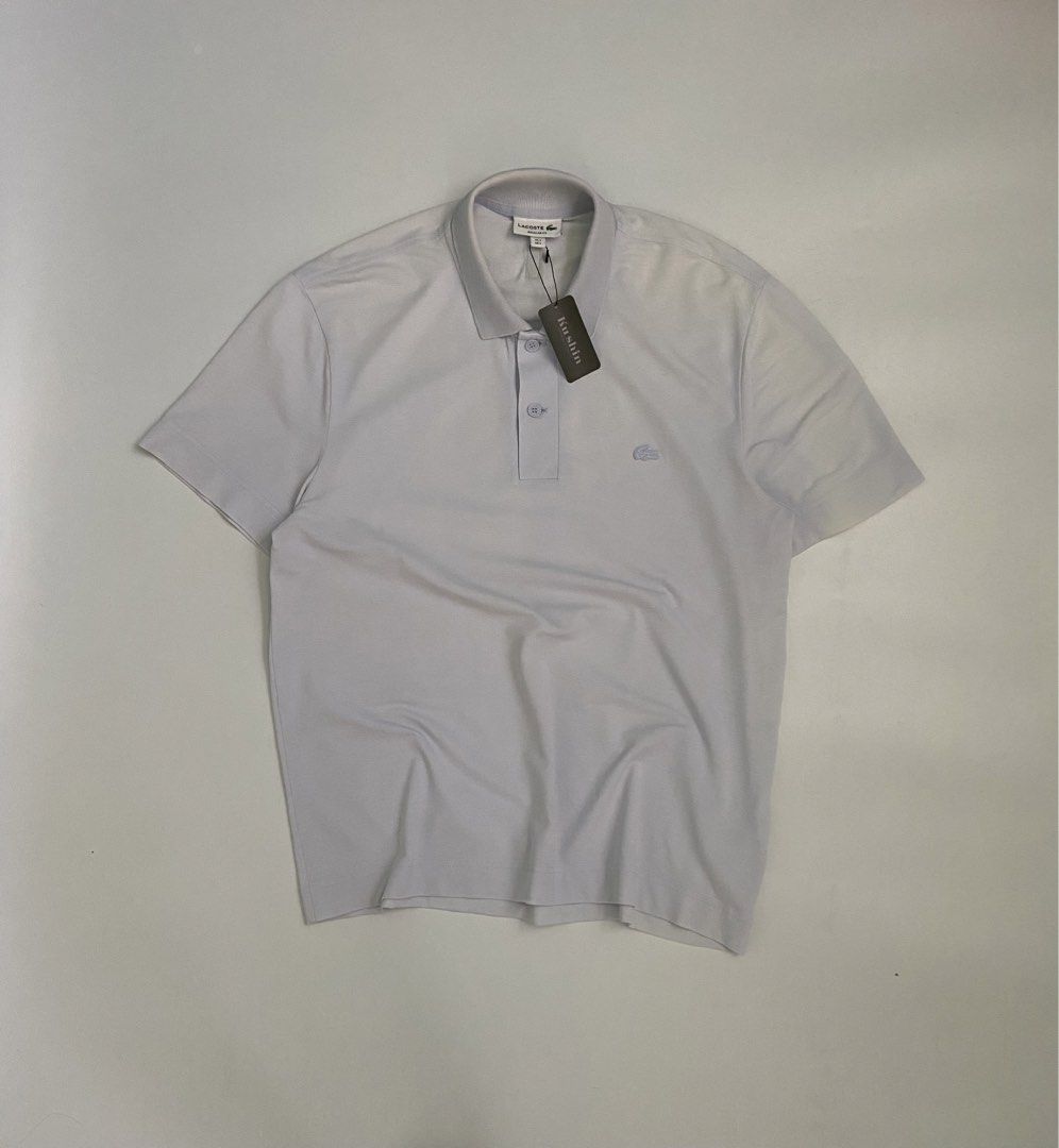 Orig lacoste (Category: Formal Shirts) located in Libmanan. Submitted by kushin2.0 (Listing ID 1460840785, Image 1). Description: Lcoste polo l Size 5 21.6 x 28.5 Good condition 100% Original Light blue Pastel Still Presentable Need wash.