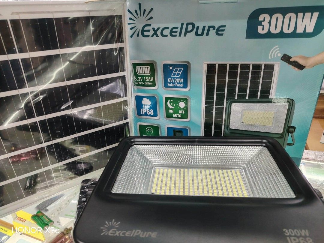 Original ExcelPure 300W Solar Flood Light with Remote Control (Category: Lighting) located in Manila. Submitted by iliasjen3082126 (Listing ID 1460773144, Image 1). Description: - ExcelPure 300W Solar Flood Light - Includes 6V/20W Solar Panel - Features 3.2V 15AH LiFePO4 Battery - IP68 Water Resistant - ON/OFF/AUTO Modes - Remote Control Included - Ideal for Outdoor Lighting 100 watts-1200 200 watts-1500 300 -2000.