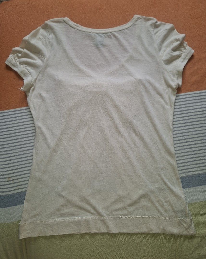Original Mango (Category: Blouses) located in Rodriguez. Submitted by jsfashionolshop (Listing ID 1460741552, Image 3). Description: Mango Basics blouse with a bow detail and puff sleeves color cream Size Small.