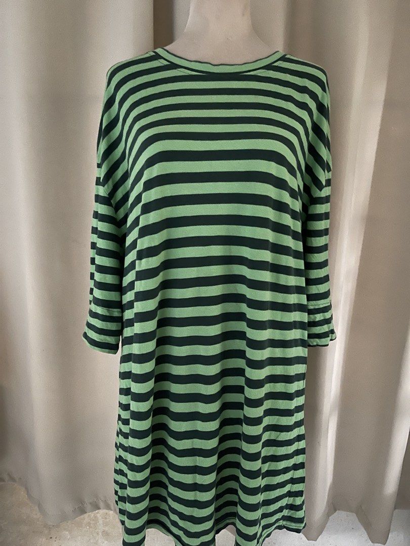 oversize tee/loose shirtdress (Category: Dresses) located in Cainta. Submitted by zlove111 (Listing ID 1460732807, Image 1). Description: - Casual long sleeve dress - Trendy green and black stripe pattern - Classic crew neck - Relaxed, comfy fit - Ideal for everyday wear - Versatile: wear alone or with leggings up to xxxl 28" 33".