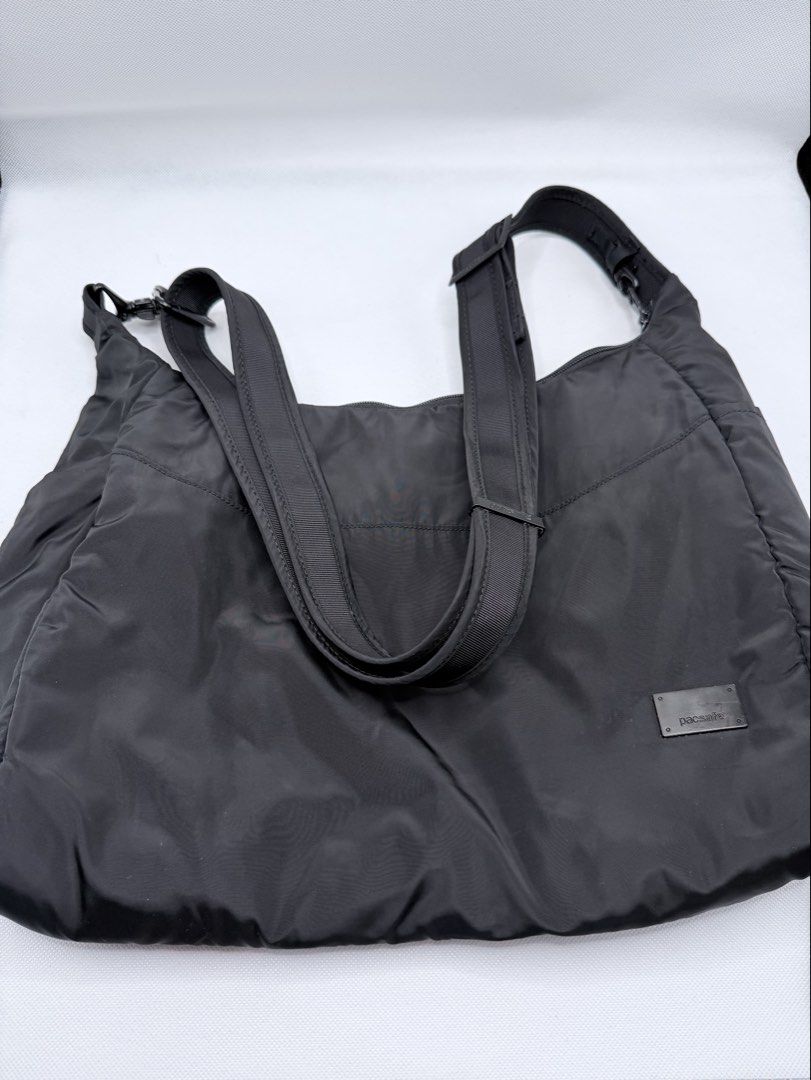 Pacsafe Orig Sling Bag (Category: Cross-body Bags) located in Quezon City. Submitted by ajandstevenshopscorner (Listing ID 1460464226, Image 1). Description: May side compartments Spacious .
