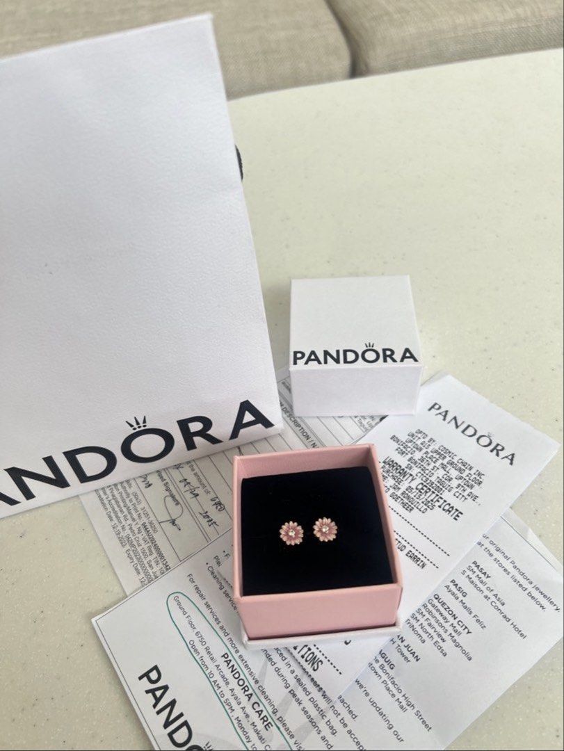 Pandora Pink Daisy Flower Stud Earrings (Category: Earrings) located in Makati City. Submitted by leiralou (Listing ID 1460798732, Image 1). Description: - Pandora Pink Daisy Flower Stud Earrings - Product Code: 288773C01 - Brand new!!!! - Includes original box, bag, and receipt - Perfect for adding a touch of color to any look.