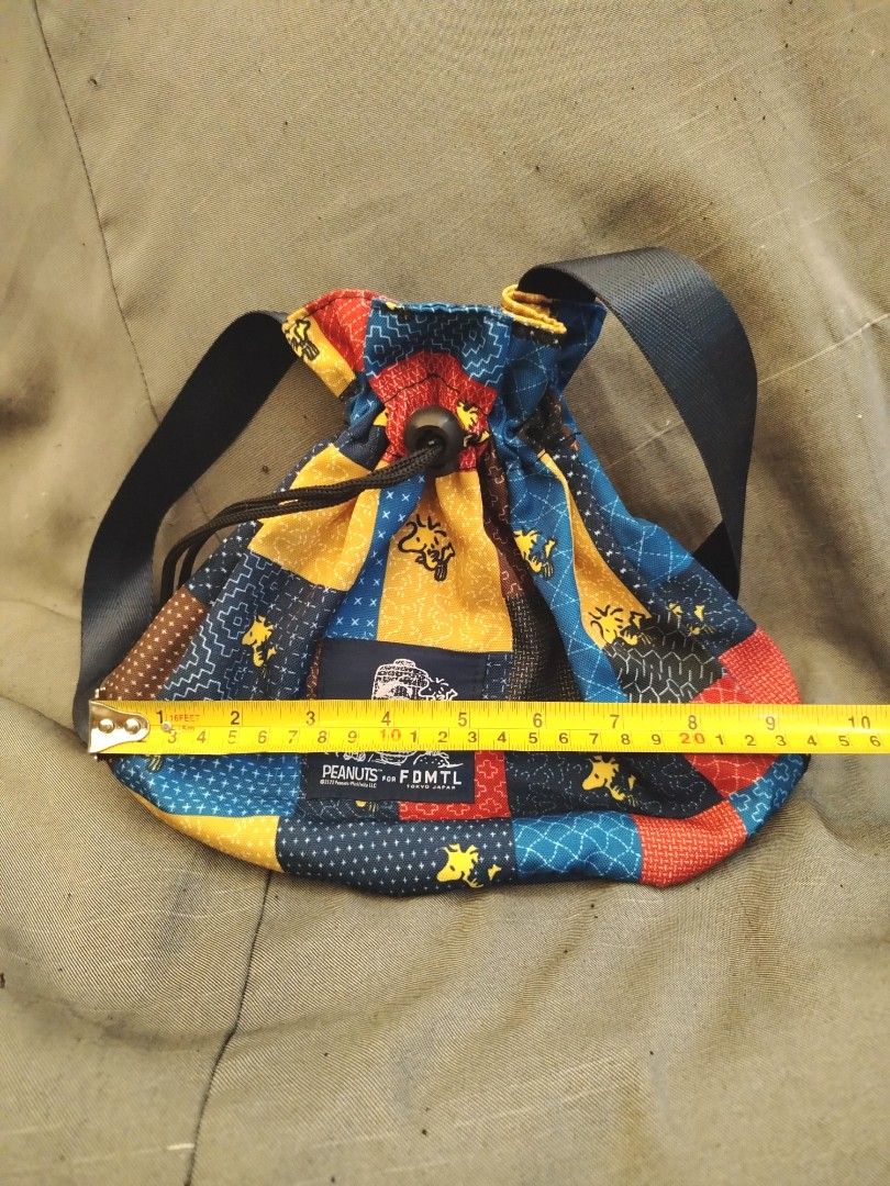 Peanuts × FDMTL Collaboration Snoopy Woodstock Patchwork Style Drawstring Bag (Category: Purses & Pouches) located in San Fernando. Submitted by jpmarketplace2023 (Listing ID 1460828295, Image 2). Description: 💚 All items are authentic from Japan. 💛 MOP: GCash (❌️ GCash Protect) 🩵 MOD: LBC only (❌️ S. Checkout, COD, COP) 💙 Meet-up: Vista Mall, San Fernando, Pampanga 💜 All items are on-hand. 🧡 First to pay gets the item first. ❤️ Breakable i