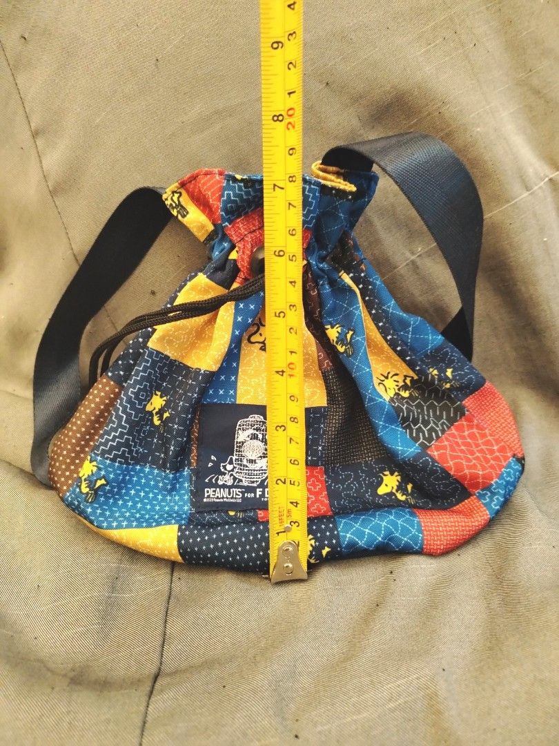 Peanuts × FDMTL Collaboration Snoopy Woodstock Patchwork Style Drawstring Bag (Category: Purses & Pouches) located in San Fernando. Submitted by jpmarketplace2023 (Listing ID 1460828295, Image 3). Description: 💚 All items are authentic from Japan. 💛 MOP: GCash (❌️ GCash Protect) 🩵 MOD: LBC only (❌️ S. Checkout, COD, COP) 💙 Meet-up: Vista Mall, San Fernando, Pampanga 💜 All items are on-hand. 🧡 First to pay gets the item first. ❤️ Breakable i