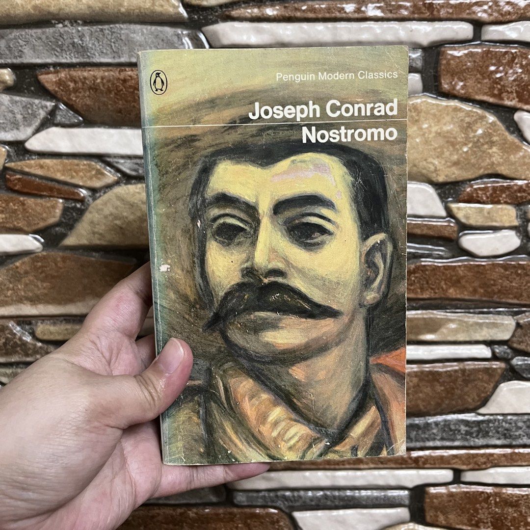 Penguin Modern Classics: Nostromo by Joseph Conrad (Category: Storybooks) located in San Pedro. Submitted by rainyydayy (Listing ID 1460915204, Image 1). Description: - Nostromo by Joseph Conrad - Penguin Modern Classics edition - Features cover art 'Zapata' by Alfredo Zalce - A classic novel by a renowned author - Perfect addition to any book collection.