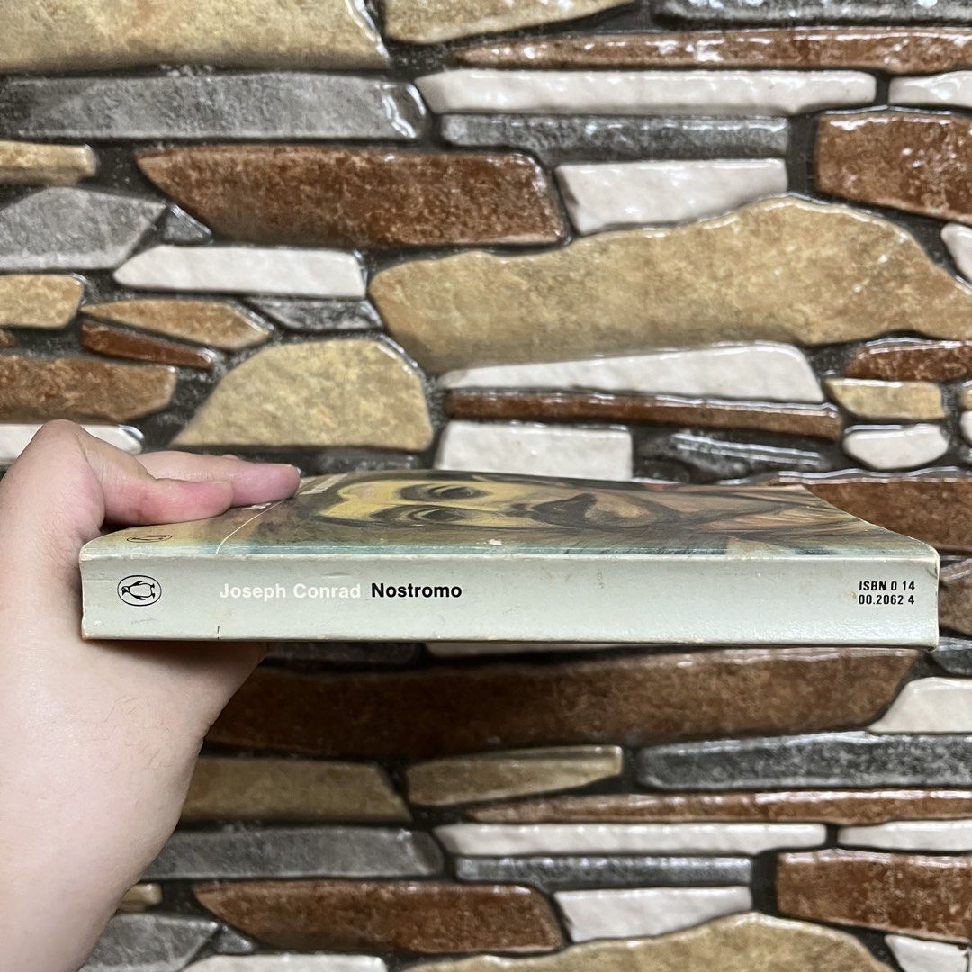 Penguin Modern Classics: Nostromo by Joseph Conrad (Category: Storybooks) located in San Pedro. Submitted by rainyydayy (Listing ID 1460915204, Image 3). Description: - Nostromo by Joseph Conrad - Penguin Modern Classics edition - Features cover art 'Zapata' by Alfredo Zalce - A classic novel by a renowned author - Perfect addition to any book collection.