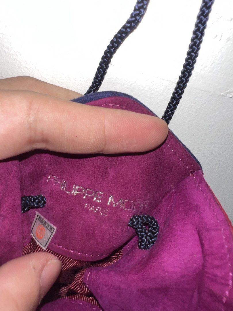 Philippe Model Paris Suede Pouch Bag with Tassel (Category: Purses & Pouches) located in Manila. Submitted by asa68984 (Listing ID 1460867859, Image 3). Description: - Philippe Model Paris purple suede pouch bag - Dark blue trim - Tassel with silver bead - Braided cord drawstring closure - Small and compact, ideal for essentials - Made in Italy.