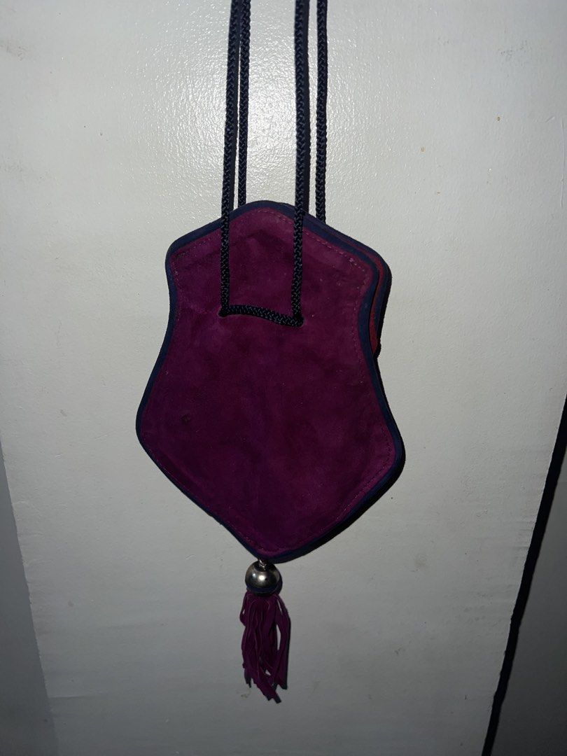 Philippe Model Paris Suede Pouch Bag with Tassel (Category: Purses & Pouches) located in Manila. Submitted by asa68984 (Listing ID 1460867859, Image 2). Description: - Philippe Model Paris purple suede pouch bag - Dark blue trim - Tassel with silver bead - Braided cord drawstring closure - Small and compact, ideal for essentials - Made in Italy.