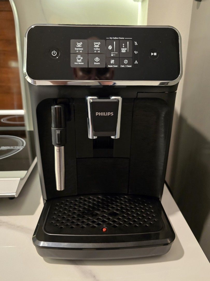 Philips Fully Automatic Espresso Machine (Category: Coffee Machines & Makers) located in Cainta. Submitted by rj.serrano (Listing ID 1460900051, Image 1). Description: The Philips Series 2200 Fully Automatic Espresso Machine EP2220 is a bean-to-cup coffee maker designed to brew espresso and regular coffee at the touch of a button. Key Features Integrated Ceramic Grinder: Features 12 adjustable grind settings made from 100% ceramic to last for at 